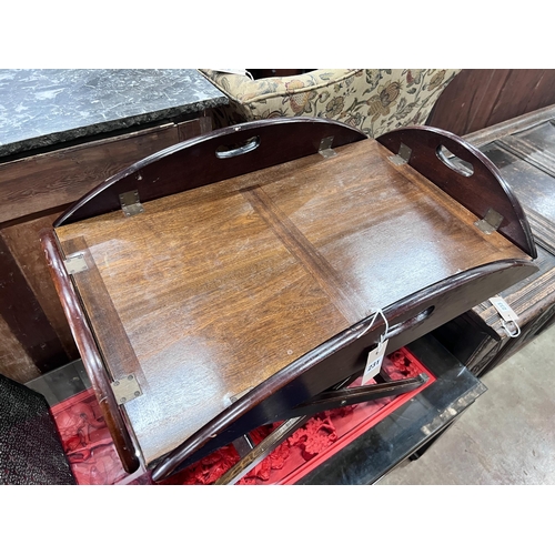 231 - A mahogany butler's tray on folding stand, width 70cm *Please note the sale commences at 9am.