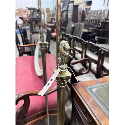 239 - A brass cheval mirror, height 138cm *Please note the sale commences at 9am.