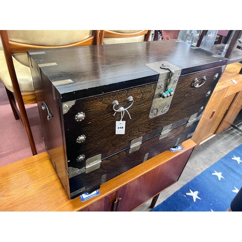 248 - A Korean brass mounted ebonised wood trunk, width 85cm *Please note the sale commences at 9am.... 