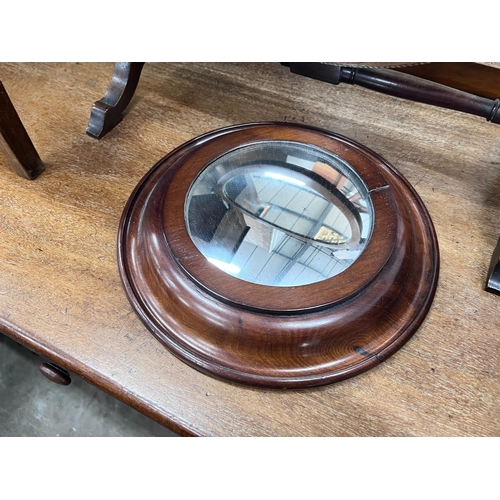 252 - An Edwardian skeleton toilet mirror, 44cm, and a convex wall mirror, 26cm *Please note the sale comm... 