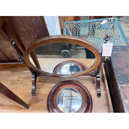 252 - An Edwardian skeleton toilet mirror, 44cm, and a convex wall mirror, 26cm *Please note the sale comm... 