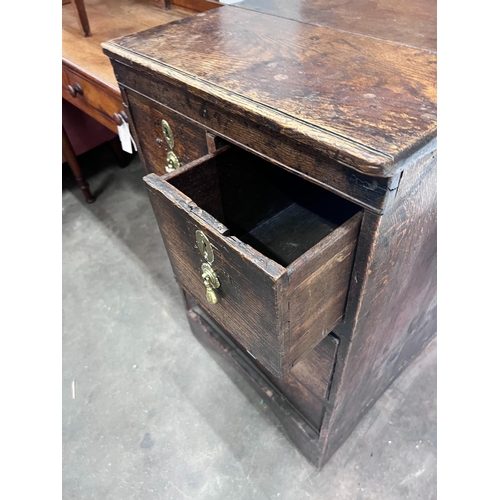 254 - An 18th century oak four drawer chest, (altered) width 54cm *Please note the sale commences at 9am.... 