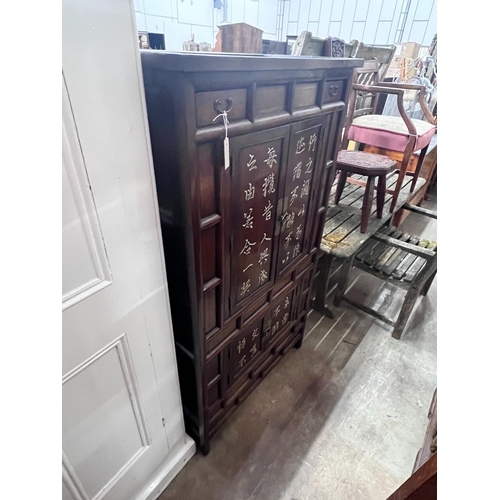 259 - A Chinese elm cabinet, width 88cm, height 155cm *Please note the sale commences at 9am.