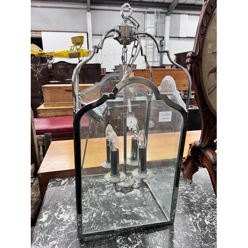 261 - A chromed metal hall lantern, width 35cm, height 75cm *Please note the sale commences at 9am.