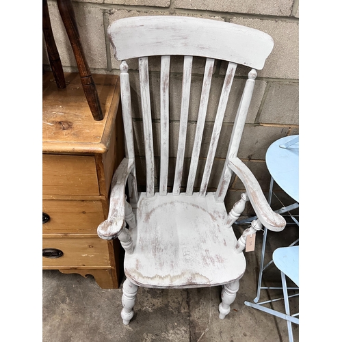 275 - A white painted beech Windsor chair *Please note the sale commences at 9am.