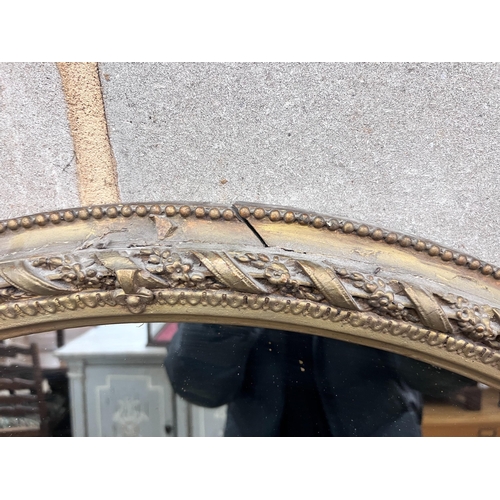 284 - A late Victorian gilt gesso overmantel mirror, width 144cm, height 150cm *Please note the sale comme... 