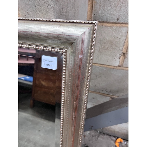 288 - A silvered wood framed wall mirror, width 74cm, height 105cm *Please note the sale commences at 9am.... 