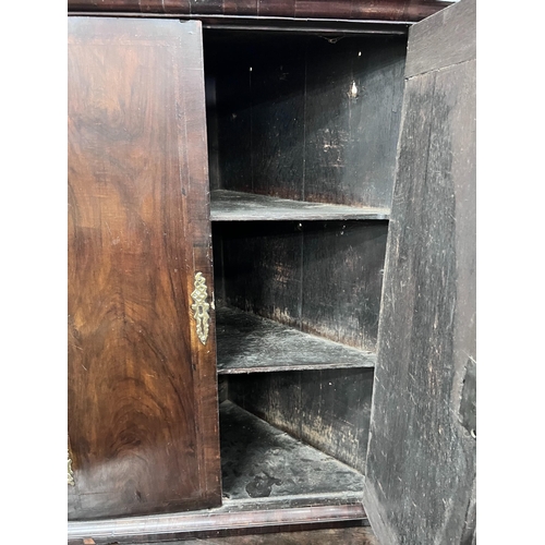 291 - Two 18th century style hanging corner cupboards, one in oak, the other walnut, width 52cm and 70cm *... 