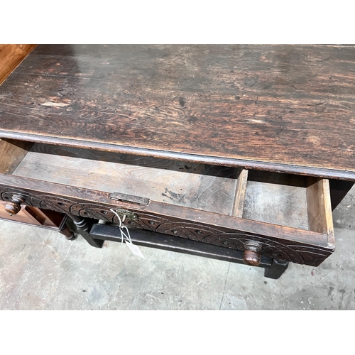 292 - A 17th century style oak side table, width 100cm *Please note the sale commences at 9am.