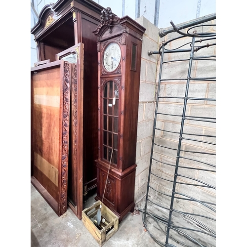 297 - An early 20th century French carved walnut thirty hour longcase clock, height 224cm *Please note the... 