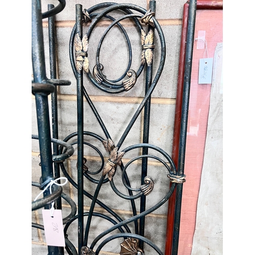 298 - A green painted wrought iron Kingsize bed frame, width 195cm *Please note the sale commences at 9am.... 