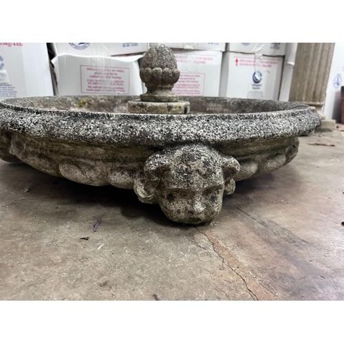 299 - A reconstituted stone garden fountain with associated pedestal, width 76cm *Please note the sale com... 