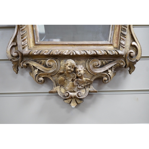 309 - A late 19th century Continental giltwood cartouche shaped wall mirror, width 54cm, height 100cm *Ple... 