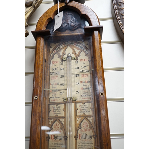 310 - An Admiral Fitzroy oak cased barometer, 117cm Ivory submission reference: LDTFPXB1 *Please note the ... 