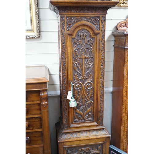 317 - A late Victorian Camerer Cuss & Co carved oak chiming longcase clock, height 237cm *Please note the ... 