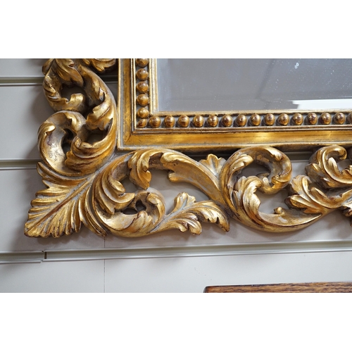 319 - A Florentine giltwood wall mirror, width 98cm, height 77cm *Please note the sale commences at 9am.... 