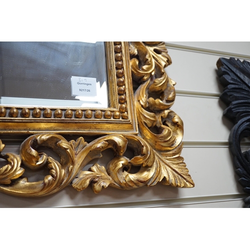 319 - A Florentine giltwood wall mirror, width 98cm, height 77cm *Please note the sale commences at 9am.... 