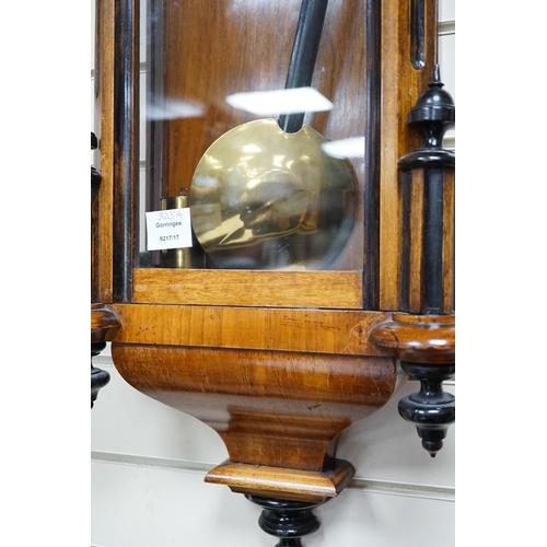 325A - A late 19th century walnut and ebonised Vienna wall clock, height 118cm *Please note the sale commen... 