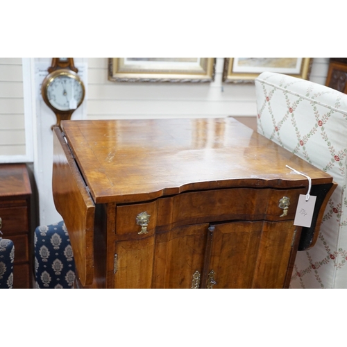 334 - A 1930's walnut bedside cabinet, width 55cm *Please note the sale commences at 9am.