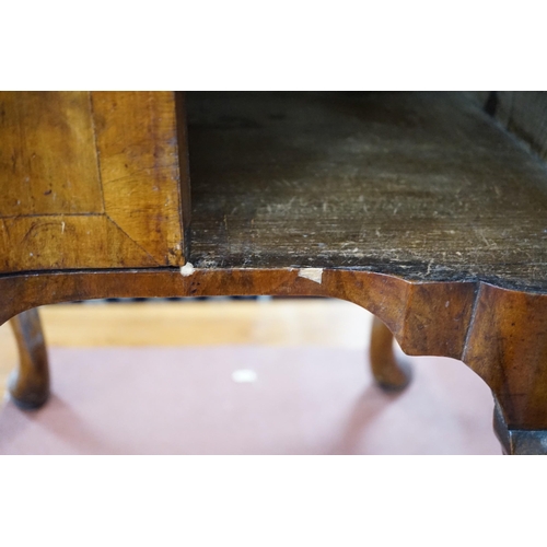 334 - A 1930's walnut bedside cabinet, width 55cm *Please note the sale commences at 9am.