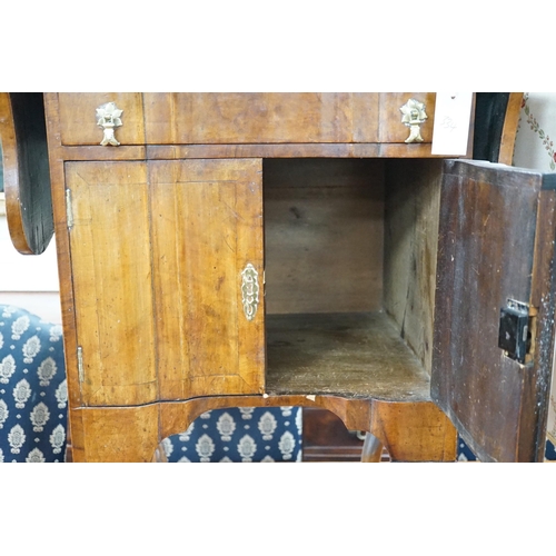 334 - A 1930's walnut bedside cabinet, width 55cm *Please note the sale commences at 9am.