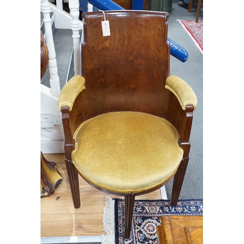 335A - A stylish Art Deco mahogany elbow chair by Trollope and Son, numbered 4088, height 95cm *Please note... 