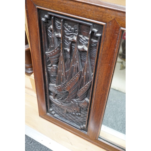 336A - A Chinese hardwood relief carved wall mirror, width 114cm, height 53cm *Please note the sale commenc... 