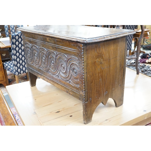 343 - A 17th century style carved oak coffer, width 84cm *Please note the sale commences at 9am.