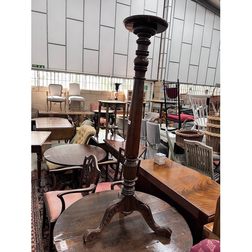 36 - A George III style mahogany torchere, height 131cm *Please note the sale commences at 9am.