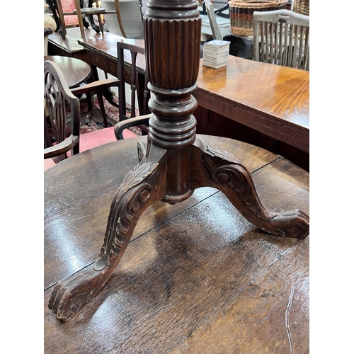 36 - A George III style mahogany torchere, height 131cm *Please note the sale commences at 9am.