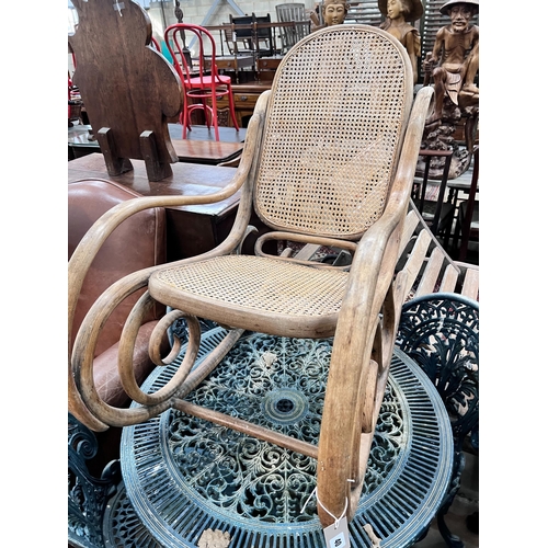 40 - A caned bentwood rocking chair, width 52cm, height 88cm *Please note the sale commences at 9am.... 