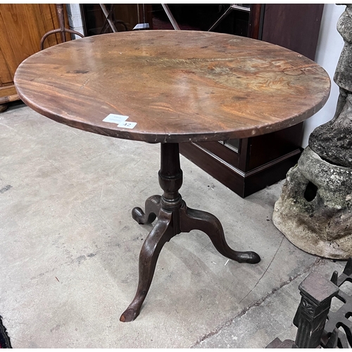 42 - A George III oval top tilt top tripod tea table, width 79cm, depth 65cm, height 71cm *Please note th... 