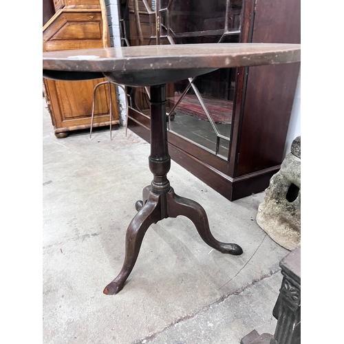 42 - A George III oval top tilt top tripod tea table, width 79cm, depth 65cm, height 71cm *Please note th... 