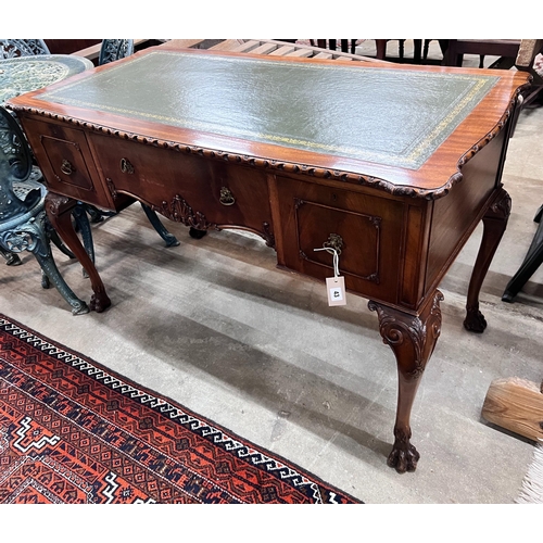 43 - A reproduction George III style mahogany kneehole writing table, width 120cm, depth 58cm, height 76c... 