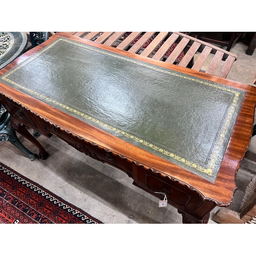 43 - A reproduction George III style mahogany kneehole writing table, width 120cm, depth 58cm, height 76c... 