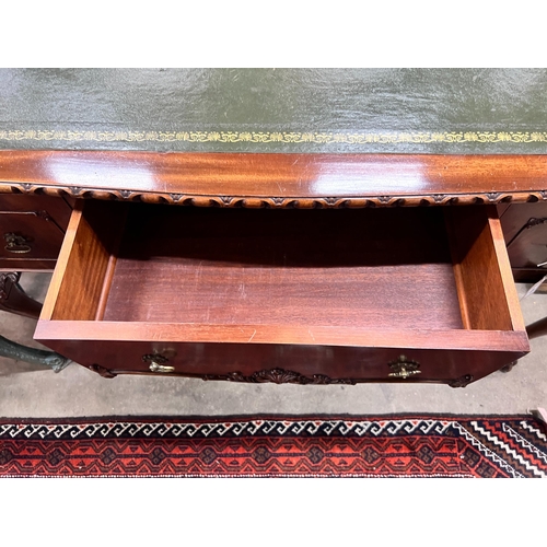 43 - A reproduction George III style mahogany kneehole writing table, width 120cm, depth 58cm, height 76c... 