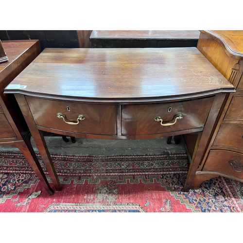 48 - A George III mahogany bowfront two drawer side table, width 86cm, depth 54cm, height 74cm *Please no... 