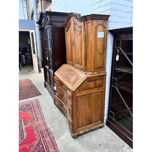 5 - A 19th century German walnut bureau cabinet, width 105cm, depth 57cm, height 188cm*Please note the s... 