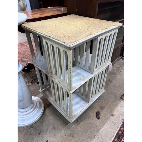 53 - A painted revolving bookcase, width 47cm, height 73cm *Please note the sale commences at 9am.