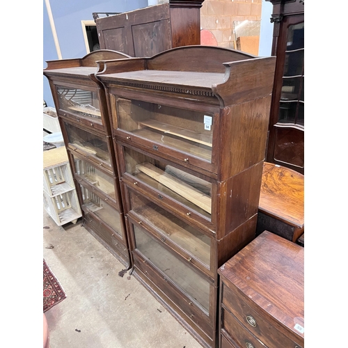 54 - A pair of Edwardian two tier oak Lebus four section bookcases, width 89cm, depth 36cm, height 166cm ... 