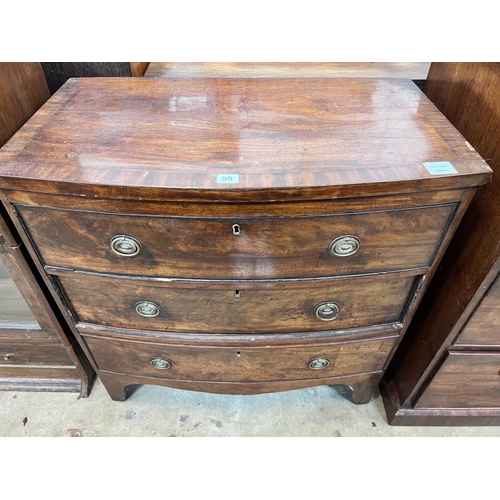 55 - A small Regency banded mahogany three drawer bowfront chest, width 77cm, depth 43cm, height 77cm *Pl... 