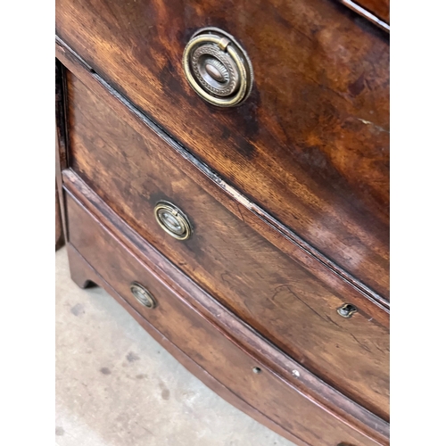 55 - A small Regency banded mahogany three drawer bowfront chest, width 77cm, depth 43cm, height 77cm *Pl... 