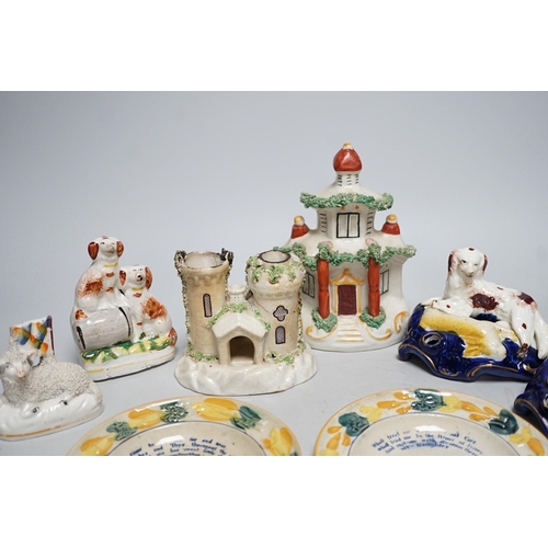 568A - A pair of 19th century Staffordshire King Charles Spaniel pen holders and two pearl ware plates etc ... 