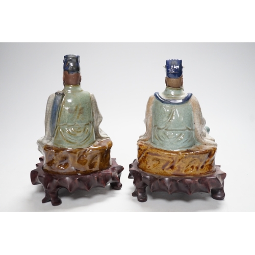 569 - Two Shiwan stoneware figures of the Jade Emperor and Lu Dongbin, losses, 19cm