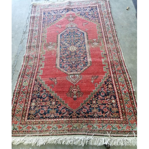 6 - Two antique North West Persian red ground rugs, (worn) larger 183 x 125cm *Please note the sale comm... 