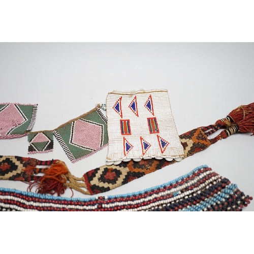 613 - A selection of tribal geometric beadwork, to include a waistband believed to be Zulu