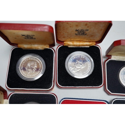 614 - Eight Royal Mint proof silver crowns and six Pobjoy Mint silver crowns