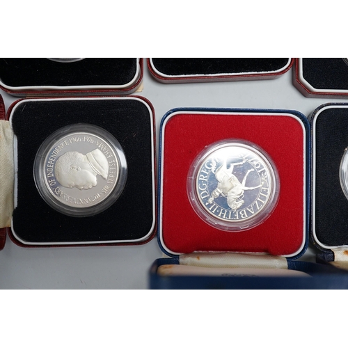 614 - Eight Royal Mint proof silver crowns and six Pobjoy Mint silver crowns