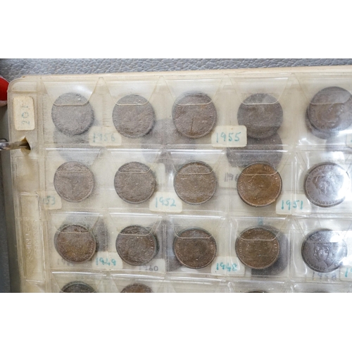 615 - UK and World coins in a case and three albums, to include Spain 5 pesetas 1885 and 1882, U.S. Morgan... 