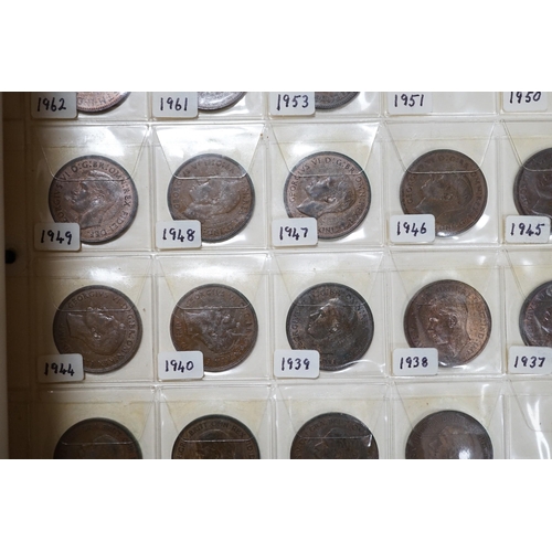 615 - UK and World coins in a case and three albums, to include Spain 5 pesetas 1885 and 1882, U.S. Morgan... 